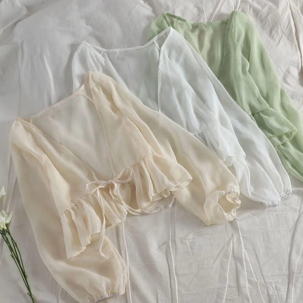 Женский повседневный шифоновый кардиган, однотонная блузка с рюшами и длинными рукавами, солнцезащитная шаль с бантом спереди
Женский повседневный шифоновый кардиган, однотонная блузка с рюшами и длинными рукавами, солнцезащитная шаль с бантом спереди