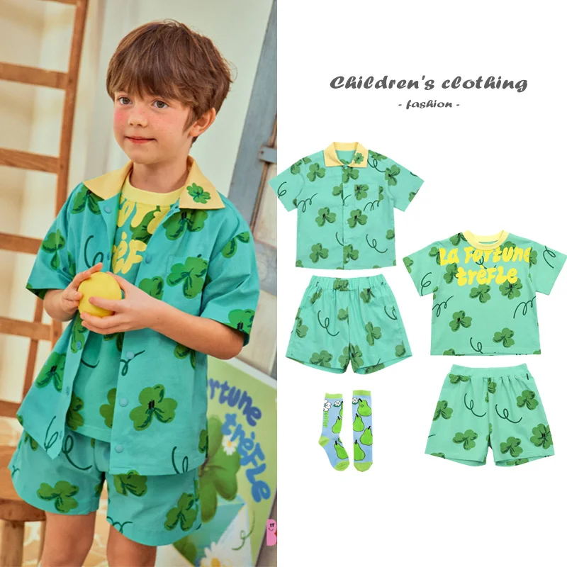 Korean Children's Set Summer New Fashion Clover Print Baby Boy T-shirt Shorts Casual Green Girl Shirt Top 2025 Kids Clothes 
Korean Children's Set Summer New Fashion Clover Print Baby Boy T-shirt Shorts Casual Green Girl Shirt Top 2025 Kids Clothes