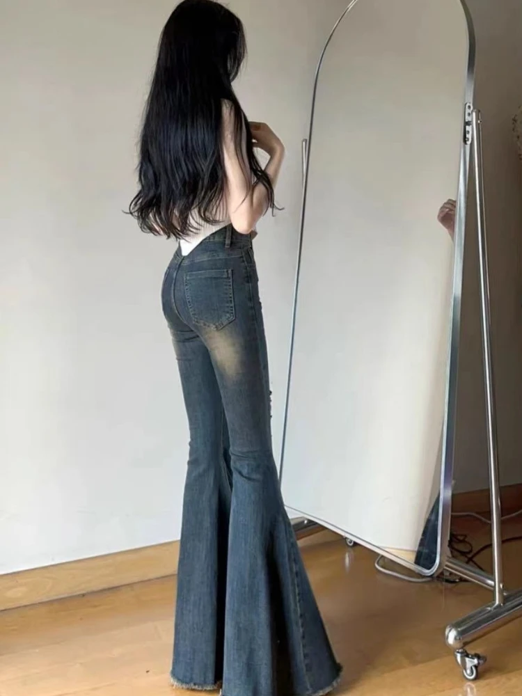 New Arrival 2026 Spring Women Vintage Bootcut Jeans High Waist with Torn Details and Retro Designer Style
New Arrival 2026 Spring Women Vintage Bootcut Jeans High Waist with Torn Details and Retro Designer Style