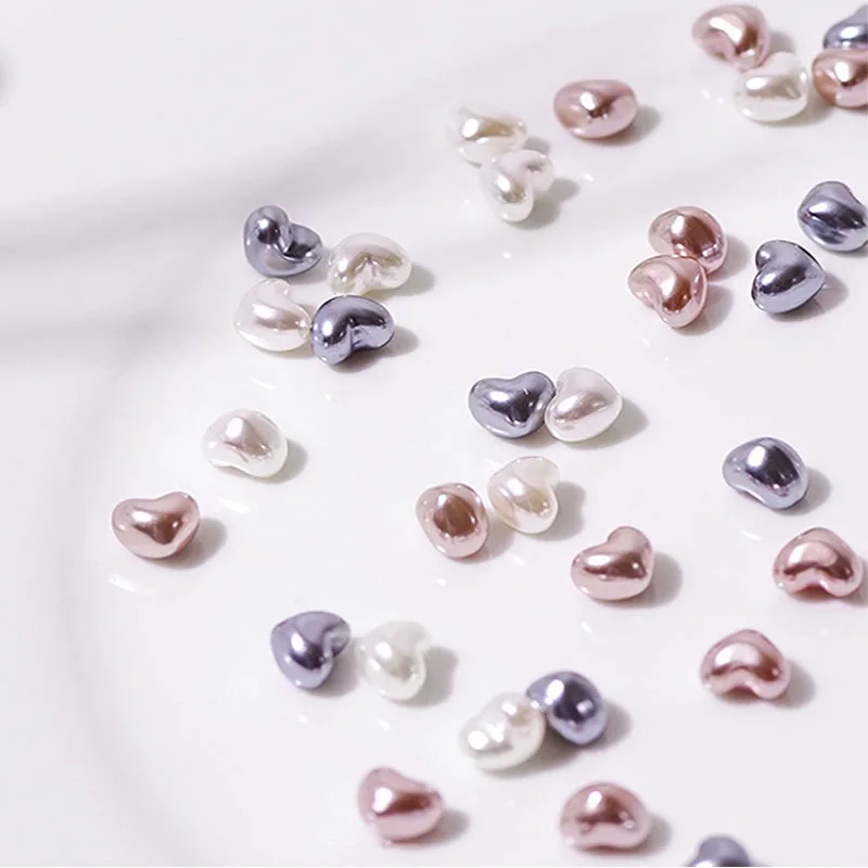 15Pcs/Box Nail Art Pearl Rhinestones 10Pcs Small Size And 5Pcs Big Size Nail Art Charms 4 Colors Heart Nail Art Decoration Gems
15Pcs/Box Nail Art Pearl Rhinestones 10Pcs Small Size And 5Pcs Big Size Nail Art Charms 4 Colors Heart Nail Art Decoration Gems