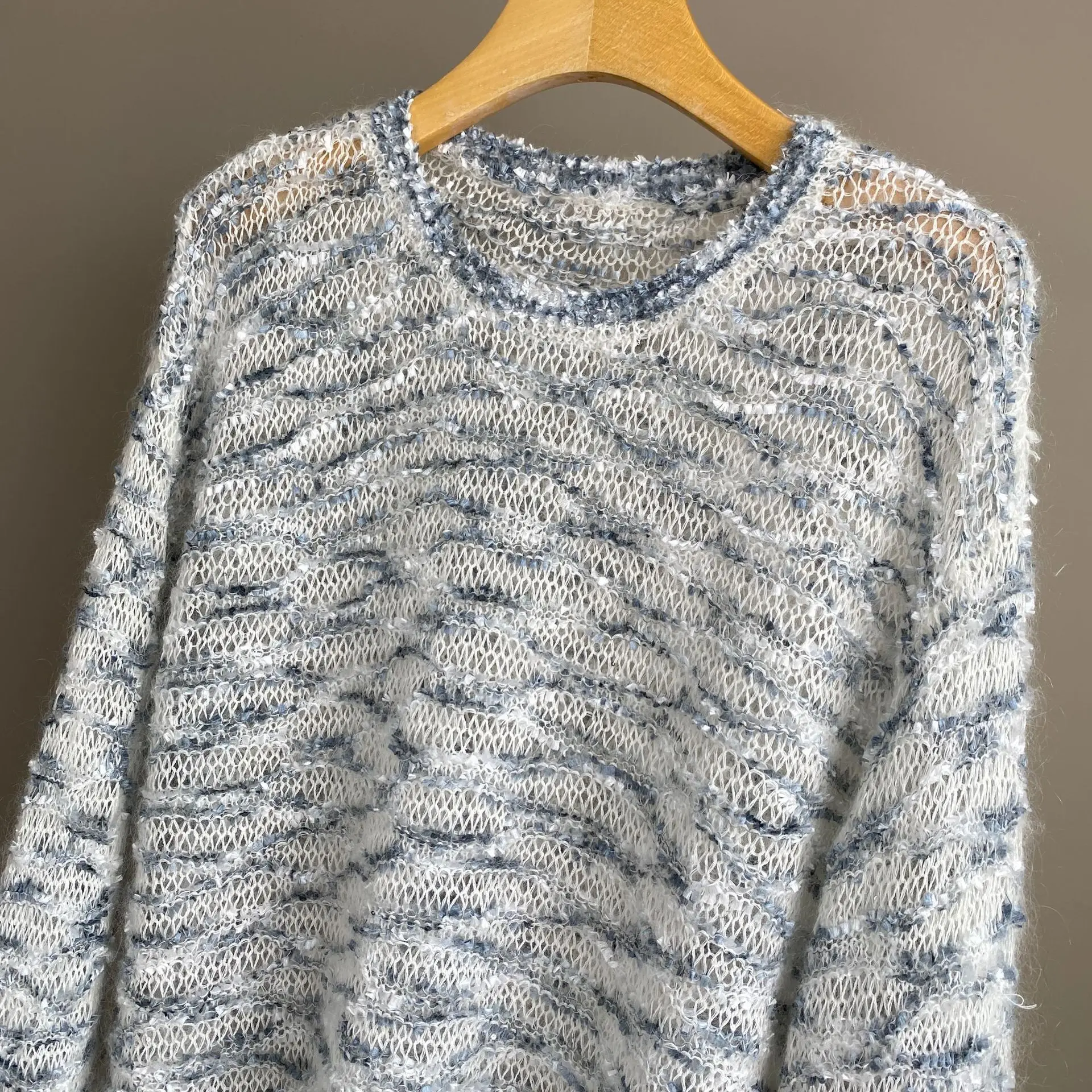 Осень-зима 2025 г., новый вязаный свитер из смешанного мохера с круглым вырезом и блестками, модный универсальный свитер
Осень-зима 2025 г., новый вязаный свитер из смешанного мохера с круглым вырезом и блестками, модный универсальный свитер