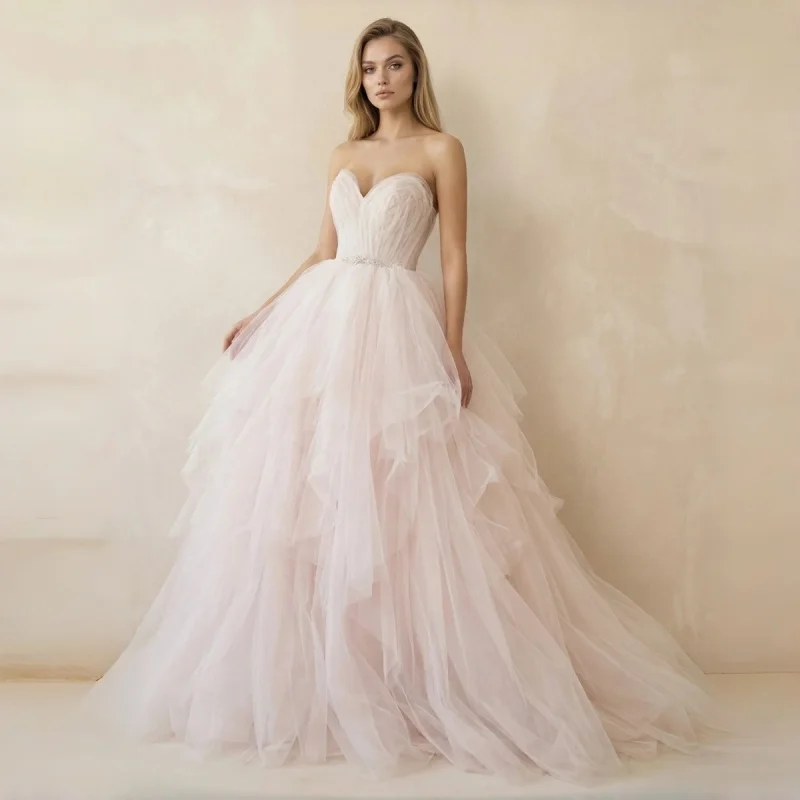Dreamy Blush Strapless Tulle Ball gown Crystal Beaded Waistband Hand Ruched Bodice Layered Ruffle Tulle Ballgown Cathedral Train
Dreamy Blush Strapless Tulle Ball gown Crystal Beaded Waistband Hand Ruched Bodice Layered Ruffle Tulle Ballgown Cathedral Train