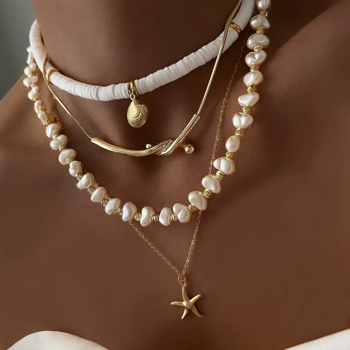Комплект пляжного ожерелья в стиле бохо — многослойное колье из искусственного жемчуга и морской звезды, летние украшения из керамических бусин для бережного бабушки в стиле бабушки 
Комплект пляжного ожерелья в стиле бохо — многослойное колье из искусственного жемчуга и морской звезды, летние украшения из керамических бусин для бережного бабушки в стиле бабушки
