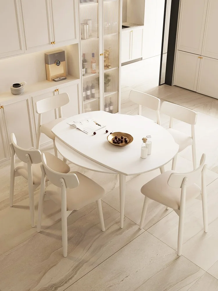 Pure white rock board dining table, expandable and foldable, square and circular dual purpose variable round table
Pure white rock board dining table, expandable and foldable, square and circular dual purpose variable round table