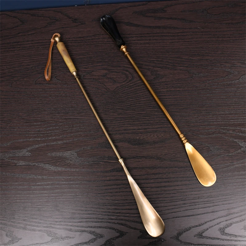 Brass shoehorn imported long handle shoe wearer household
Brass shoehorn imported long handle shoe wearer household