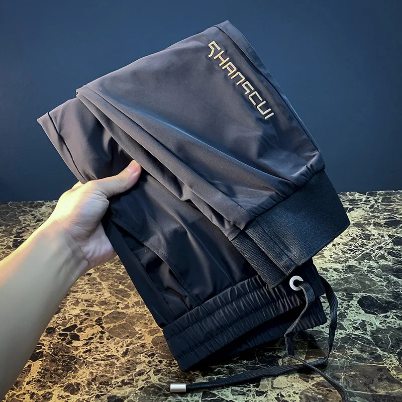 Summer thin ice silk casual pants for men, 2025 new fashionable breathable drawstring leg tied sports pants
Summer thin ice silk casual pants for men, 2025 new fashionable breathable drawstring leg tied sports pants