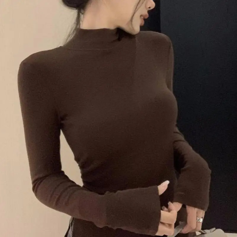 Немецкая бархатная базовая рубашка с высоким воротником и длинными рукавами для женщин, осенняя мода, универсальный стиль чистого желания, разделенный топ, новый стиль
Немецкая бархатная базовая рубашка с высоким воротником и длинными рукавами для женщин, осенняя мода, универсальный стиль чистого желания, разделенный топ, новый стиль