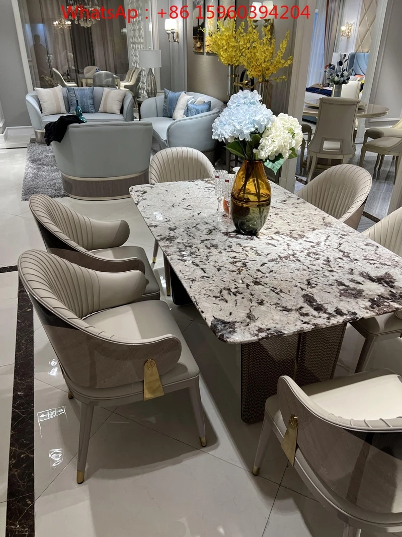 Italian minimalist marble table and chair combination household dining table restaurant light luxury table
Italian minimalist marble table and chair combination household dining table restaurant light luxury table