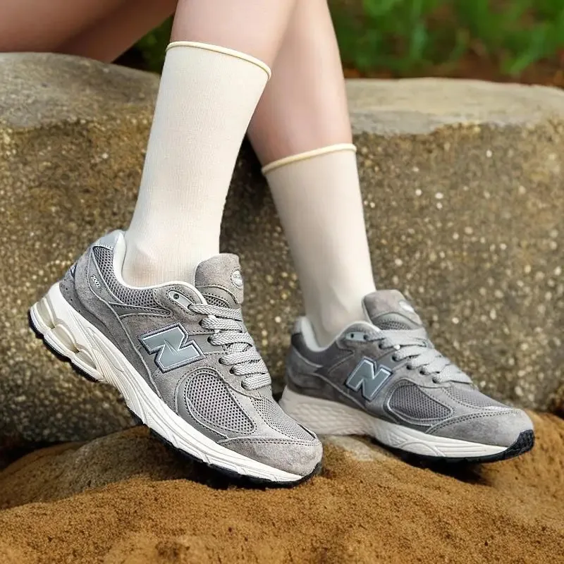 Students runner 2002 fashionable new sports shoes with bright colors and sharp contrasts, simple running shoes
Students runner 2002 fashionable new sports shoes with bright colors and sharp contrasts, simple running shoes