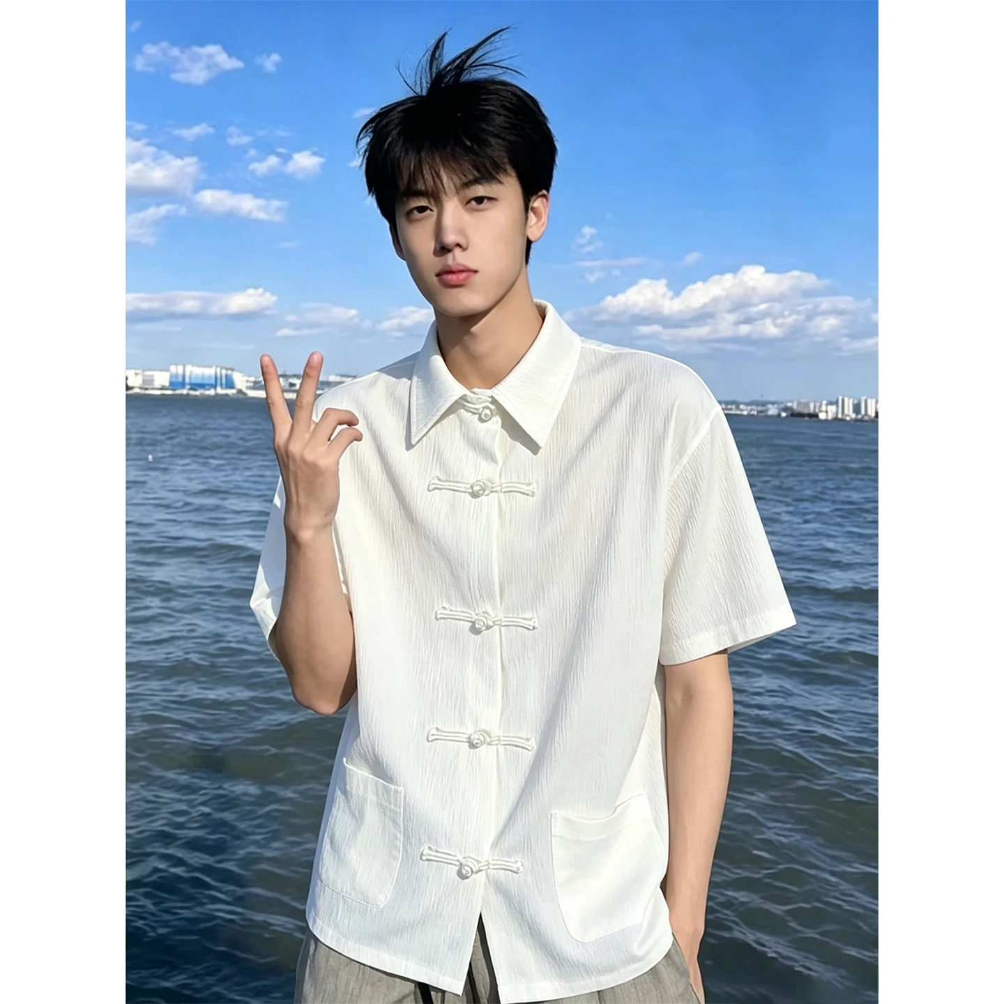 New Chinese Style Short Sleeve Shirt Men's Summer Thin Texture Half Sleeve Shirt High-End Feel Collar Outerwear Button Detail
New Chinese Style Short Sleeve Shirt Men's Summer Thin Texture Half Sleeve Shirt High-End Feel Collar Outerwear Button Detail
