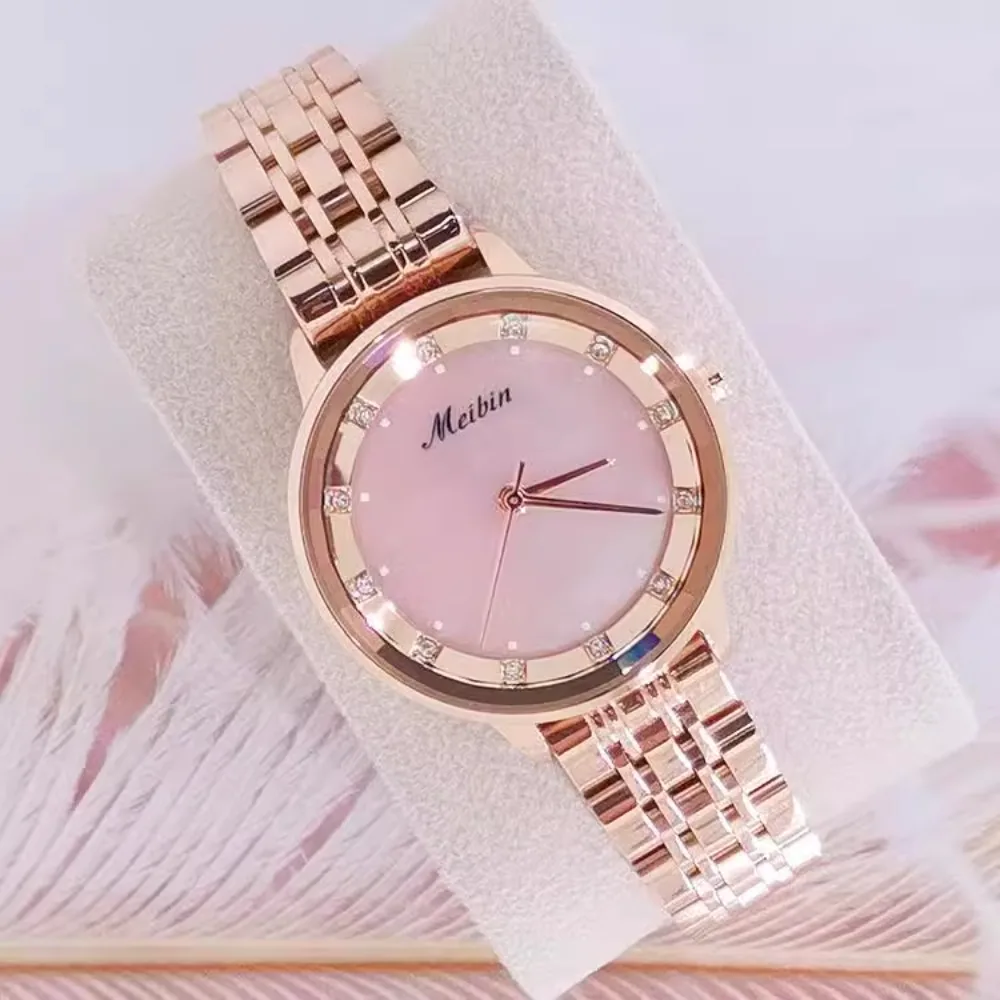 New boutique watch women's, simple temperament diamond-encrusted pink shell face women's watch
New boutique watch women's, simple temperament diamond-encrusted pink shell face women's watch