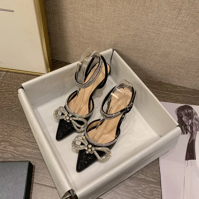 Black bow high heels women's stiletto summer 2025 pointed thin flash rhinestone strap empty bag head sandals
Black bow high heels women's stiletto summer 2025 pointed thin flash rhinestone strap empty bag head sandals