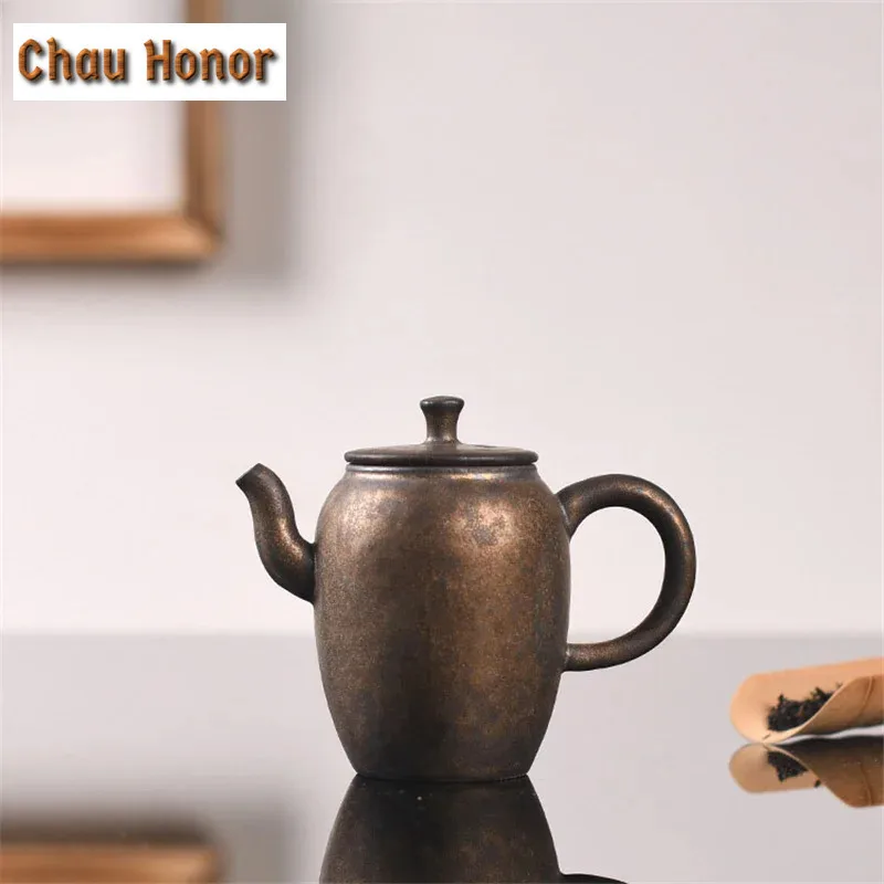 210ml Vintage Kiln Fambe Ceramic Teapot Handmade Sprinkle Gold Glaze Small Master Pots Dahongpao Teaware As Wish Gift Packaging
210ml Vintage Kiln Fambe Ceramic Teapot Handmade Sprinkle Gold Glaze Small Master Pots Dahongpao Teaware As Wish Gift Packaging