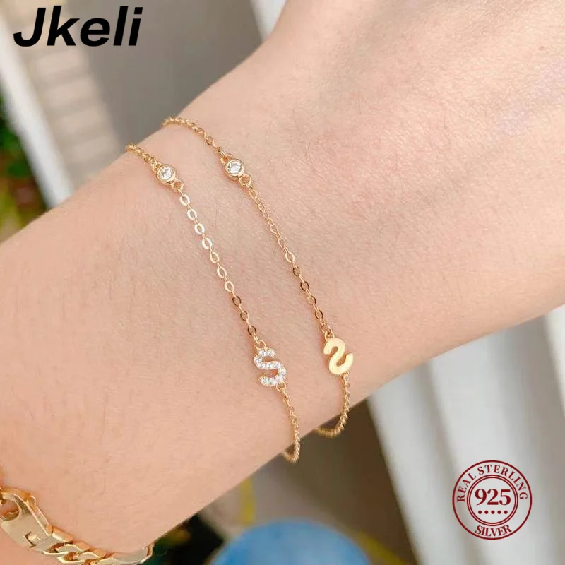 Jkeli S925 Sterling Silver 14K Gold Plated Letter Bracelet Unique Design Diamond Embedded Fashion Jewelry Accessory
Jkeli S925 Sterling Silver 14K Gold Plated Letter Bracelet Unique Design Diamond Embedded Fashion Jewelry Accessory