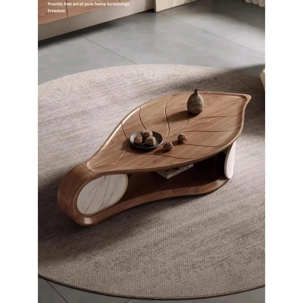 Modern light luxury designer coffee table walnut leather high-end Italian minimalist living room special-shaped coffee table
Modern light luxury designer coffee table walnut leather high-end Italian minimalist living room special-shaped coffee table