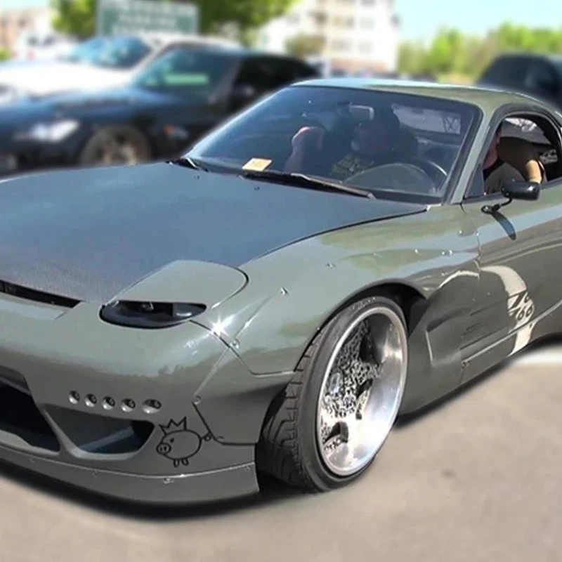 Sporty-Widebody FOR RX7 FD3S RB Style Carbon Fiber Fender Flare Add-on
Sporty-Widebody FOR RX7 FD3S RB Style Carbon Fiber Fender Flare Add-on