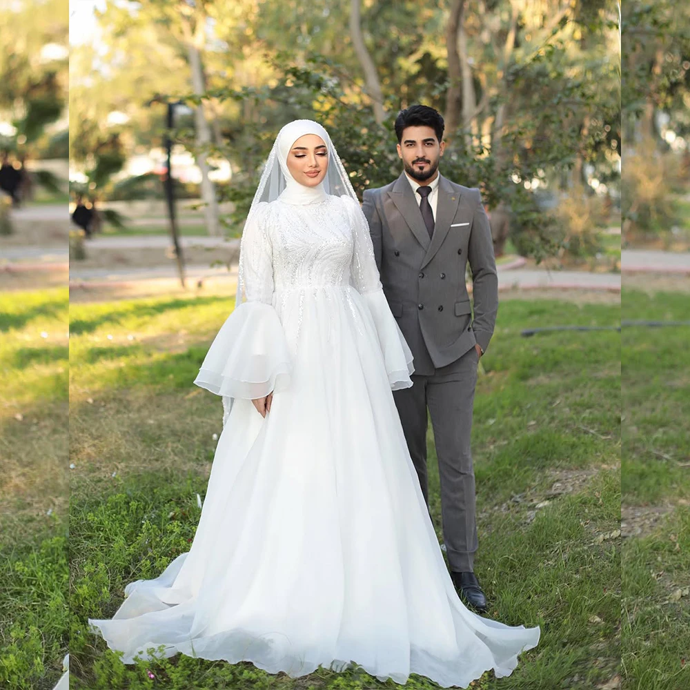 Holy Wedding Dresses for Muslim with Hijab High Neck Flare Sleeve Bride Dress Sequined A Line Bridal Gown Customized Braut Kleid
Holy Wedding Dresses for Muslim with Hijab High Neck Flare Sleeve Bride Dress Sequined A Line Bridal Gown Customized Braut Kleid