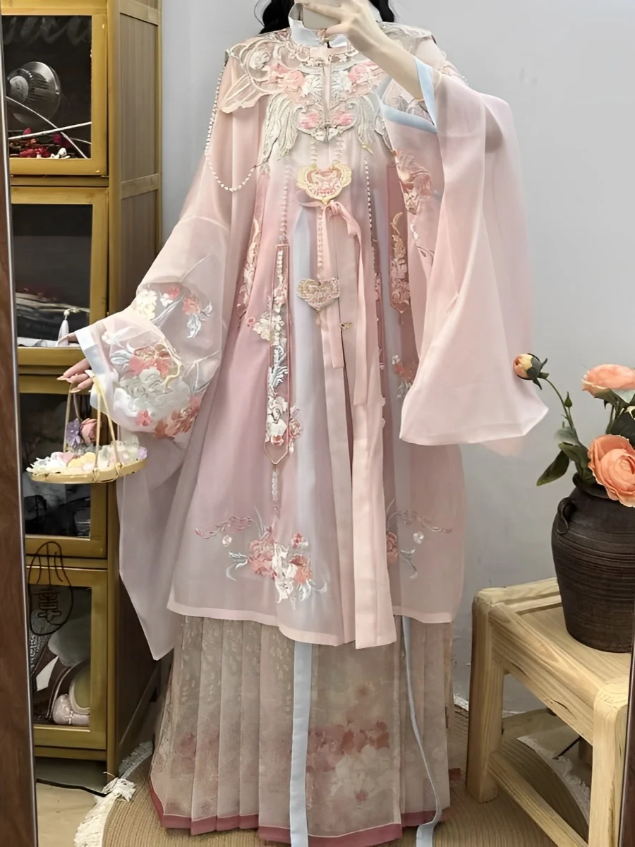 Chinese traditional Hanfu pink embroidery cloud shoulder standing collar gown horse face skirt set hairflower Hanfu
Chinese traditional Hanfu pink embroidery cloud shoulder standing collar gown horse face skirt set hairflower Hanfu