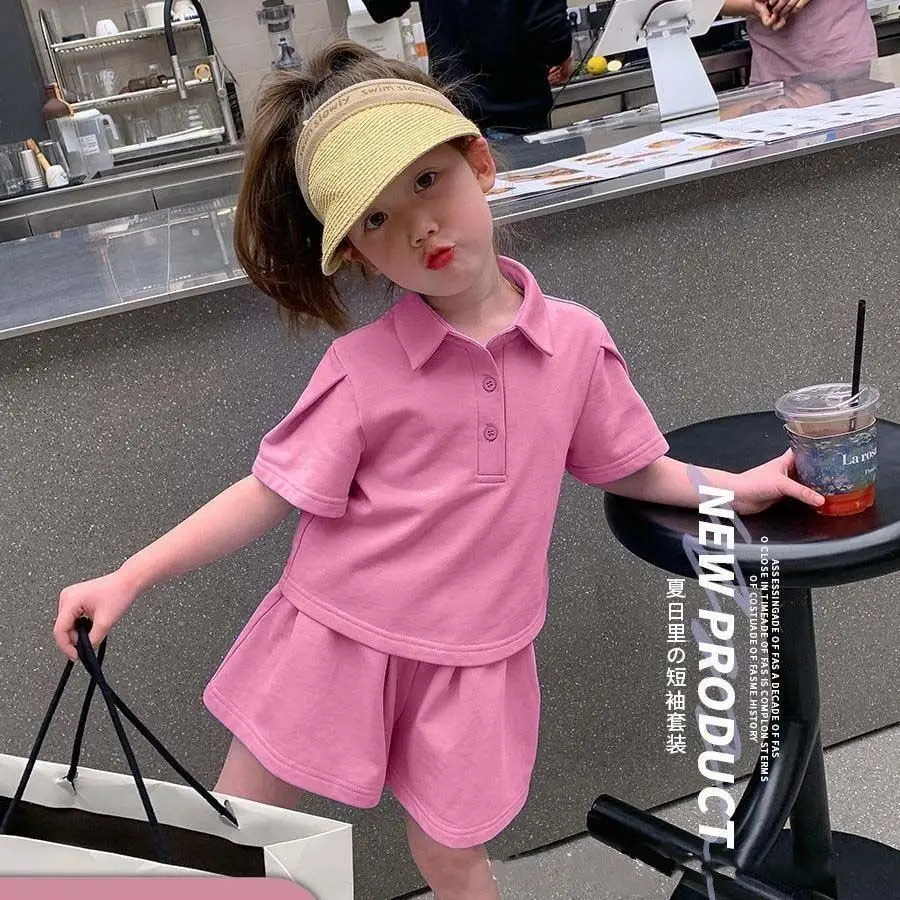 New 2025 girls' summer short sleeved set, children's minimalist polo shirt, sports shorts T-shirt two-piece set
New 2025 girls' summer short sleeved set, children's minimalist polo shirt, sports shorts T-shirt two-piece set
