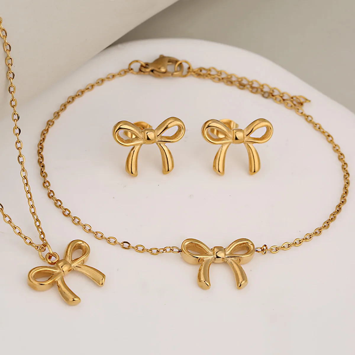 Light Luxury & Stylish Hollow Bow Pendant Stainless Steel Necklace Bracelet Earrings Set for Women, Outfit Highlight
Light Luxury & Stylish Hollow Bow Pendant Stainless Steel Necklace Bracelet Earrings Set for Women, Outfit Highlight