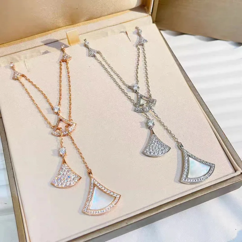 Fan Shape Pendant Y Drop Necklace For Women Sparkling Stone & Shell Inlaid Tassel Layered Chain Elegant Party Dress Jewelry Gift
Fan Shape Pendant Y Drop Necklace For Women Sparkling Stone & Shell Inlaid Tassel Layered Chain Elegant Party Dress Jewelry Gift