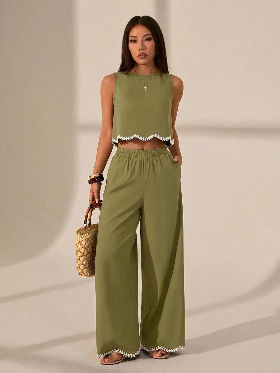 Olive Green Sleeveless Crop Top And Wide-Leg Pants Set With White Leaf-Embroidered Trim, Casual Summer Two-Piece Outfit
Olive Green Sleeveless Crop Top And Wide-Leg Pants Set With White Leaf-Embroidered Trim, Casual Summer Two-Piece Outfit