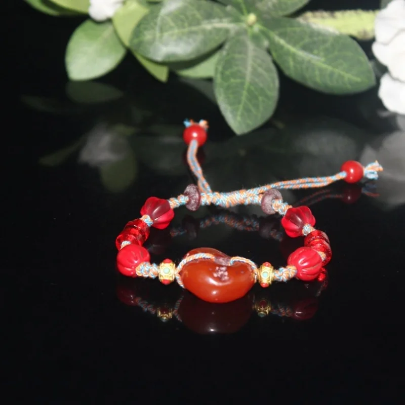 Late Qing Dynasty antique-style old glass multi-treasure bracelet with imitation amber peace and hand rope
Late Qing Dynasty antique-style old glass multi-treasure bracelet with imitation amber peace and hand rope
