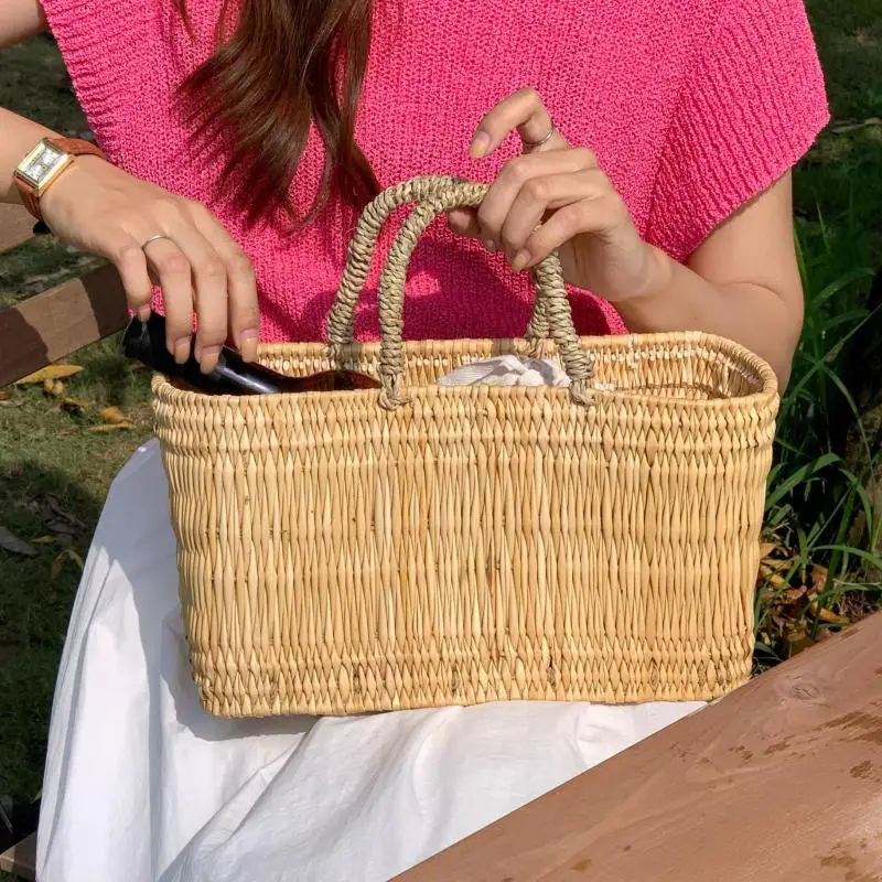 French Fashion New Large Capacity Handheld Women's Bag Simple And Casual Versatile Woven Hollow Basket Straw Bag For Women Trend
French Fashion New Large Capacity Handheld Women's Bag Simple And Casual Versatile Woven Hollow Basket Straw Bag For Women Trend