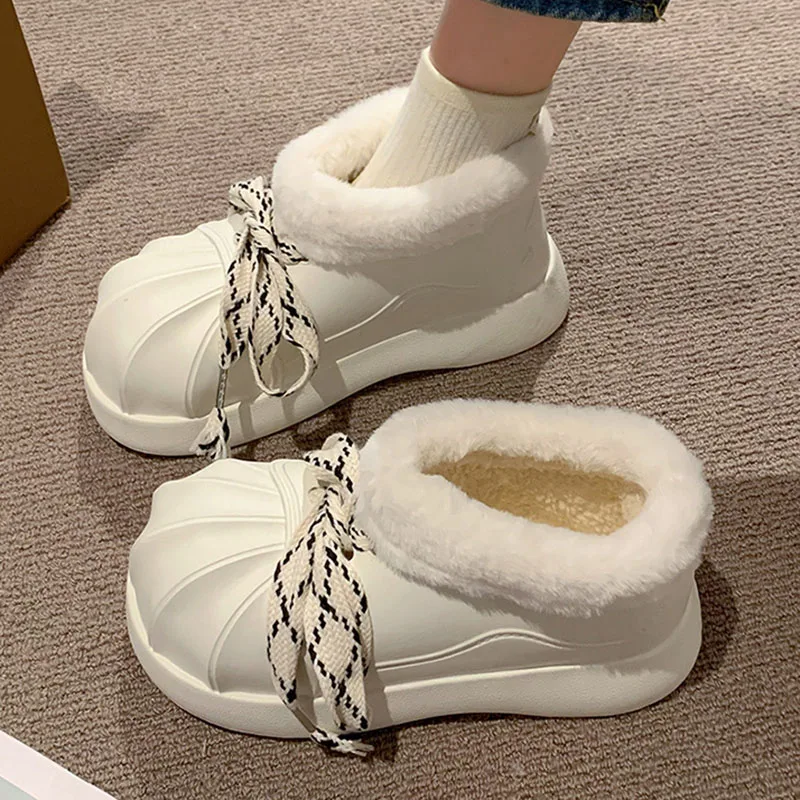 Winter thick soled snow boots for women wearing short winter outerwear cute plush and thick anti slip cotton slippers for women
Winter thick soled snow boots for women wearing short winter outerwear cute plush and thick anti slip cotton slippers for women