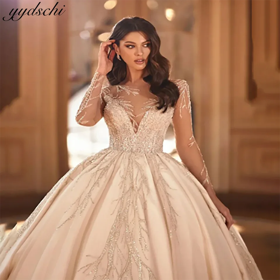 Luxurious Illusion Long Sleeves Lace Appliques Beaded Ball Gown Wedding Dresses 2025 Ruffles Court Train Bridal Gowns For Women
Luxurious Illusion Long Sleeves Lace Appliques Beaded Ball Gown Wedding Dresses 2025 Ruffles Court Train Bridal Gowns For Women