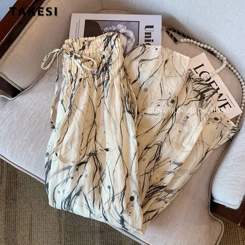 2023 Summer Casual Hand-Painted Print High Waist Wide Leg Pants Spring Women's Fashion Loose Elastic Waist Drawstring Trousers
2023 Summer Casual Hand-Painted Print High Waist Wide Leg Pants Spring Women's Fashion Loose Elastic Waist Drawstring Trousers