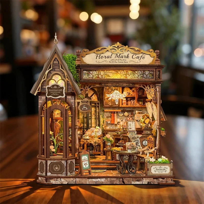OUZEY Retro Floral Mark Cafe DIY Wooden House Figurines Miniature Kits With LED Lights Home Desk Decoration Adult Handmade Gifts
OUZEY Retro Floral Mark Cafe DIY Wooden House Figurines Miniature Kits With LED Lights Home Desk Decoration Adult Handmade Gifts