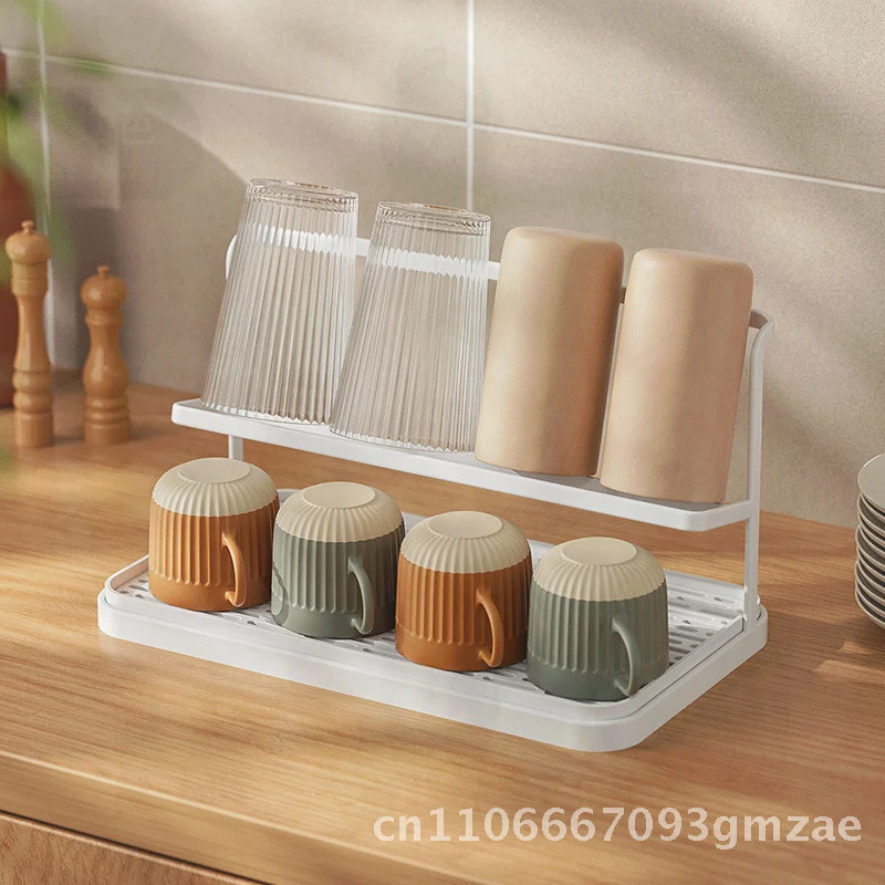 Перевернутая полка для хранения чашек, двухслойный пластиковый держатель для чашек, органайзер для чайных чашек, сливная стеклянная вешалка для чашек с водой для кухни и бара
Перевернутая полка для хранения чашек, двухслойный пластиковый держатель для чашек, органайзер для чайных чашек, сливная стеклянная вешалка для чашек с водой для кухни и бара