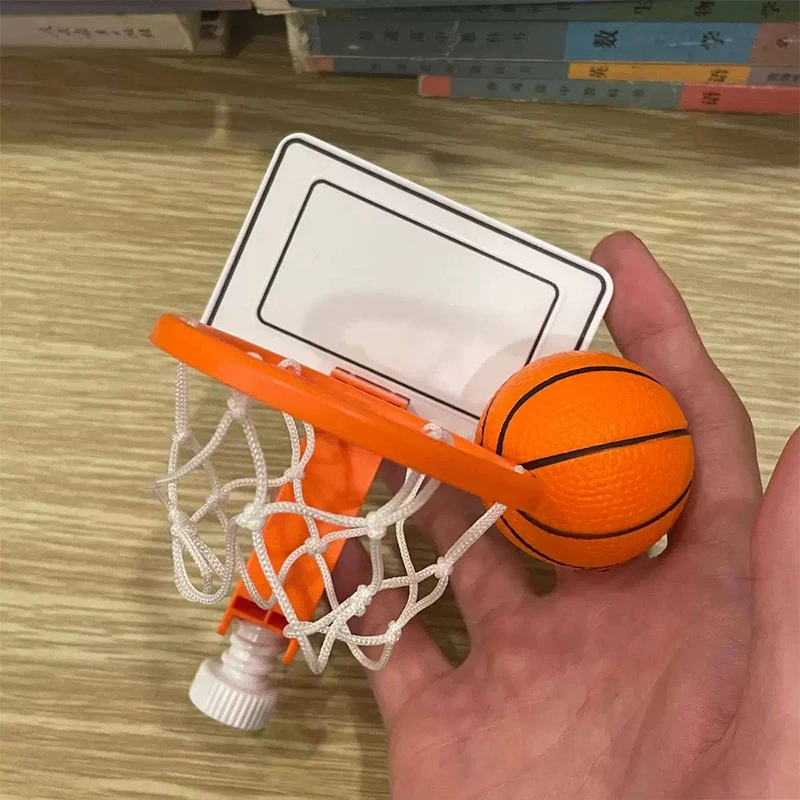 1pcs Decompression Mini Desktop Basketball Shooting Frame Creative Mini Basket Basketball Stand with No Punching Toy Figurine
1pcs Decompression Mini Desktop Basketball Shooting Frame Creative Mini Basket Basketball Stand with No Punching Toy Figurine