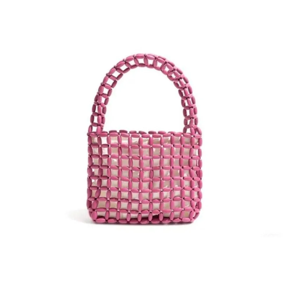 Casual Handmade Beaded Woven Bag Pure Color Creative Hollow Out Bag Boho Chic Openwork Bag Girls
Casual Handmade Beaded Woven Bag Pure Color Creative Hollow Out Bag Boho Chic Openwork Bag Girls