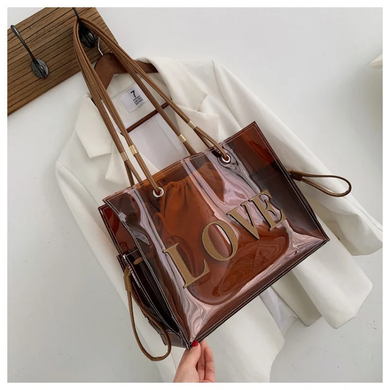 New One Shoulder Big Bag Foreign Style Women Summer Satchels Fashion Korean All-in-one Large Capacity Tote Transparent Handbag
New One Shoulder Big Bag Foreign Style Women Summer Satchels Fashion Korean All-in-one Large Capacity Tote Transparent Handbag