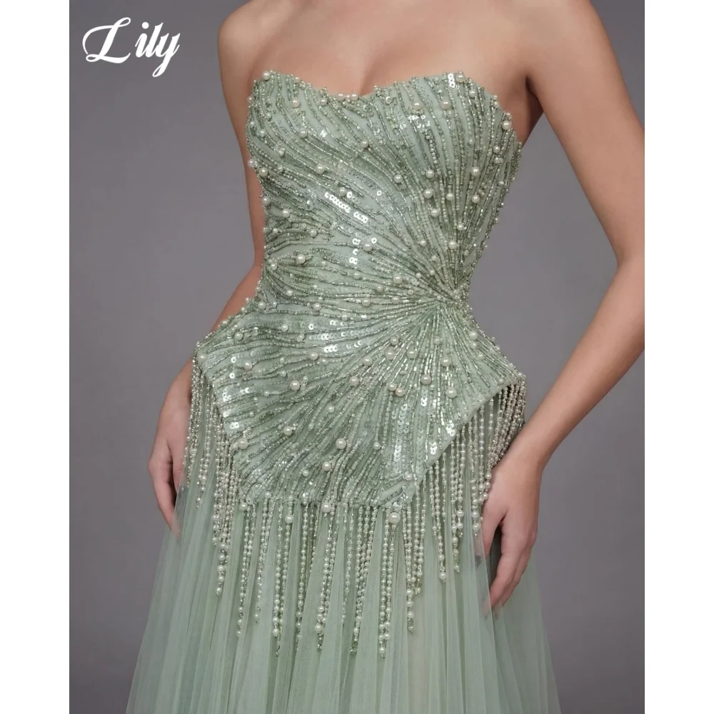 Lily Sage Green Strapless Prom Gown Beaded and Pearl Bodice with Fringe Peplum Evening Dress Tulle A-Line Party Dress Customized
Lily Sage Green Strapless Prom Gown Beaded and Pearl Bodice with Fringe Peplum Evening Dress Tulle A-Line Party Dress Customized