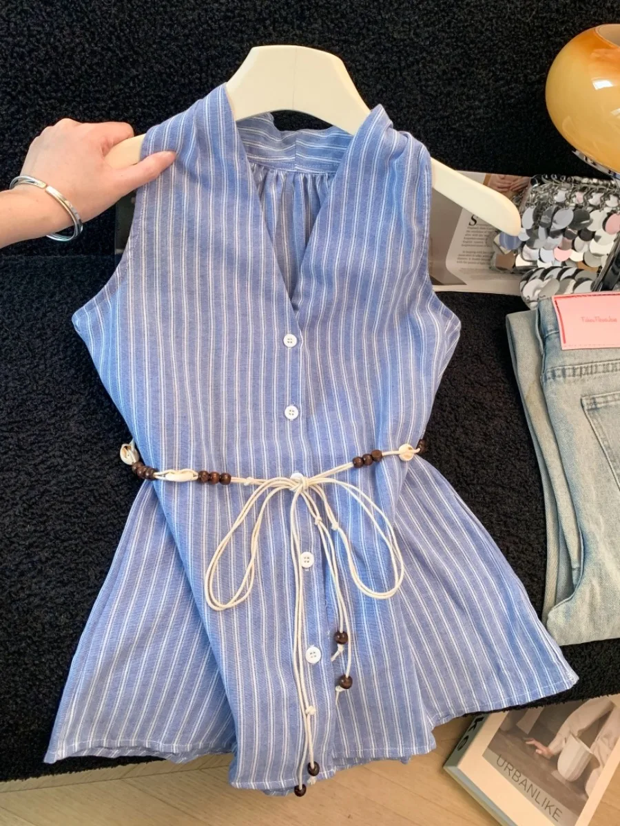 Летняя повседневная женская рубашка с V-образным вырезом без рукавов, в полоску, из хлопка и шелка, свободного кроя, с завязками на шее, с эффектом стройности, синяя
Летняя повседневная женская рубашка с V-образным вырезом без рукавов, в полоску, из хлопка и шелка, свободного кроя, с завязками на шее, с эффектом стройности, синяя