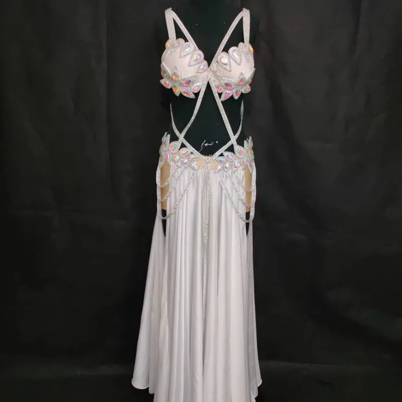 Индивидуальная одежда для танца живота, костюм для выступлений, большая распашная юбка из двух частей, простая и атмосферная для женщин, экзотическая танцевальная одежда
Индивидуальная одежда для танца живота, костюм для выступлений, большая распашная юбка из двух частей, простая и атмосферная для женщин, экзотическая танцевальная одежда