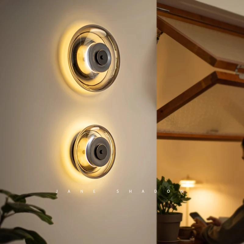 Retro industrial style brass glass wall lamp designer Nordic living room background wall bedside medieval round lamp
Retro industrial style brass glass wall lamp designer Nordic living room background wall bedside medieval round lamp