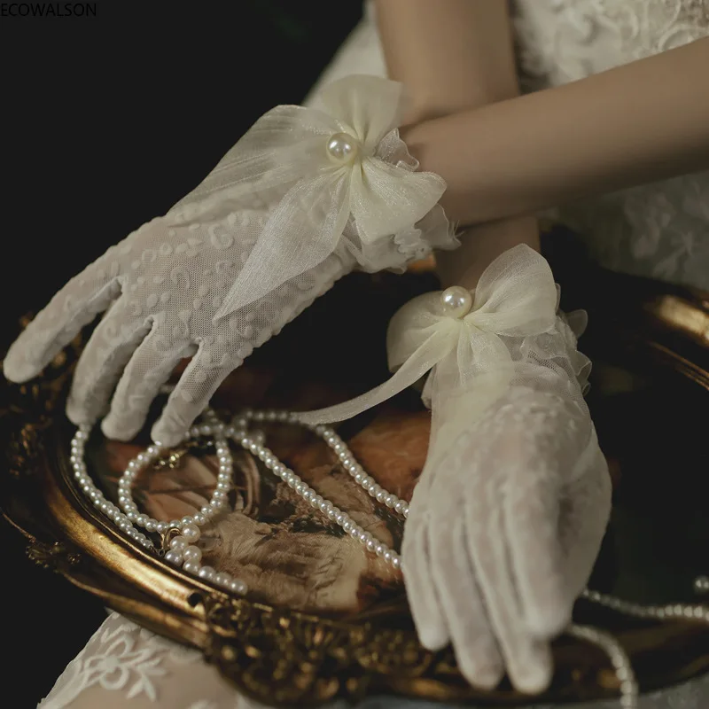 Women's Summer White Thin Short Satin Elastic Etiquette Dress Gloves Elegant Pearl Lace Bow UV Sunscreen Cycling Driving Mittens
Women's Summer White Thin Short Satin Elastic Etiquette Dress Gloves Elegant Pearl Lace Bow UV Sunscreen Cycling Driving Mittens