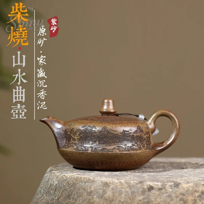 Yixing Zisha Teapot Handcrafted High-Temperature Wood-Fired Agarwood Clay Landscape Curved Teapot Kung Fu Tea Set
Yixing Zisha Teapot Handcrafted High-Temperature Wood-Fired Agarwood Clay Landscape Curved Teapot Kung Fu Tea Set