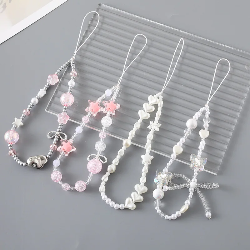 Love Pearl Bow Phone Chain
Love Pearl Bow Phone Chain