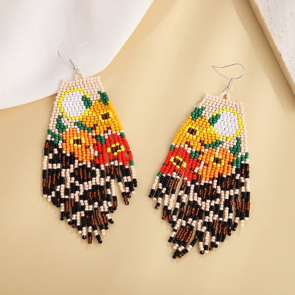 Beaded earrings Tassels Sunflower Roses Hand knitting Patterns Fashion Simplicity Female Alloy Bohemian Rice bead earrings 
Beaded earrings Tassels Sunflower Roses Hand knitting Patterns Fashion Simplicity Female Alloy Bohemian Rice bead earrings