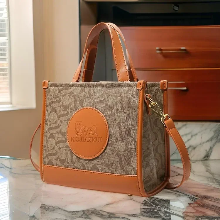 Elegant High-End Casual Crossbody Bag Large Capacity Leather Tote Messenger Purse Unique Letter Logo Design 
Elegant High-End Casual Crossbody Bag Large Capacity Leather Tote Messenger Purse Unique Letter Logo Design
