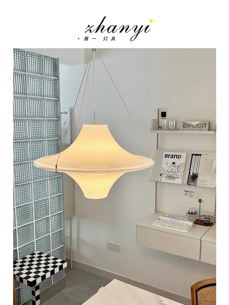 Medieval cream wind chandelier Bauhaus Nordic creative personality restaurant dining table study eye protection flying saucer
Medieval cream wind chandelier Bauhaus Nordic creative personality restaurant dining table study eye protection flying saucer