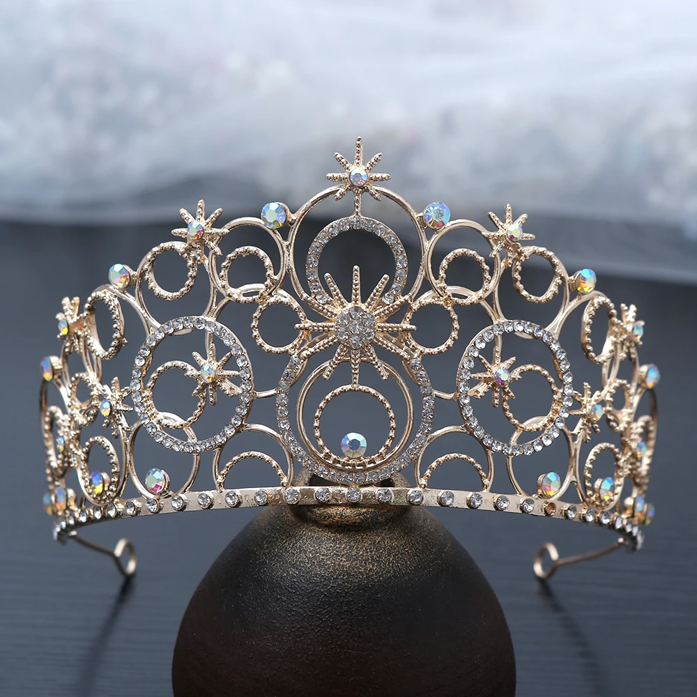 Небесные блестящие волосы Корона Звезды Кристаллы Смысловатый круглый филигранный дизайн Идеальный свадебный вид Сказка Королевская элегантность
Небесные блестящие волосы Корона Звезды Кристаллы Смысловатый круглый филигранный дизайн Идеальный свадебный вид Сказка Королевская элегантность