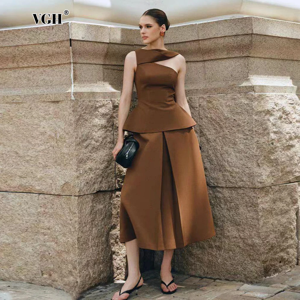 Элегантное женское платье VGH Niche Design Sense: приталенное, с круглым вырезом, без рукавов, с завышенной талией и складками. Новинка в женской моде.
Элегантное женское платье VGH Niche Design Sense: приталенное, с круглым вырезом, без рукавов, с завышенной талией и складками. Новинка в женской моде.