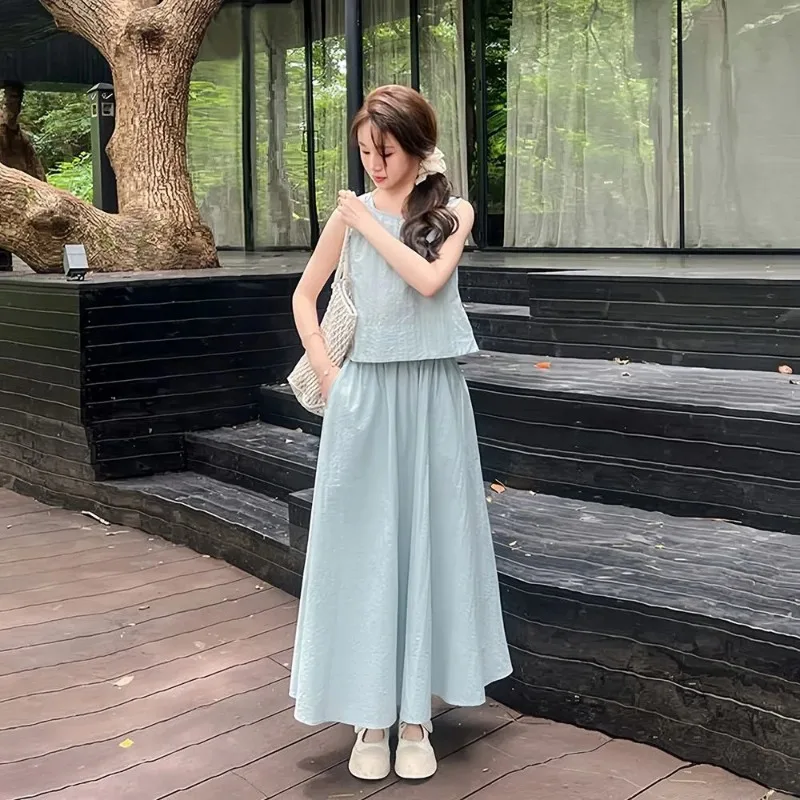 Модная французская жилетка без рукавов для женщин и юбка трапециевидной формы средней длины, женская полуюбка, модный костюм
Модная французская жилетка без рукавов для женщин и юбка трапециевидной формы средней длины, женская полуюбка, модный костюм