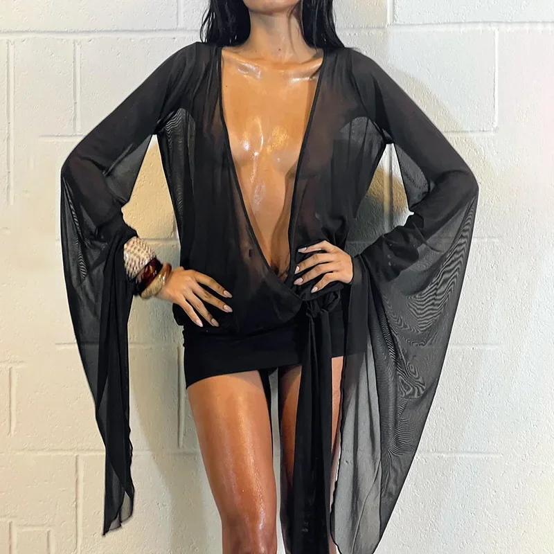 2025 Mesh See Through Sexy Mini Dress For Women Black Sheer Mesh Deep V Neck Long Sleeve Backless Draped Ruched Dress
2025 Mesh See Through Sexy Mini Dress For Women Black Sheer Mesh Deep V Neck Long Sleeve Backless Draped Ruched Dress